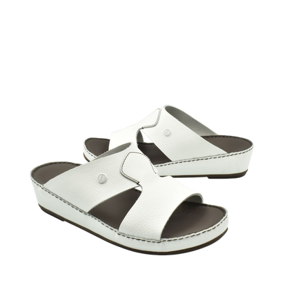 White leather luxury slip-on footwear with cushioned sole and open toe design