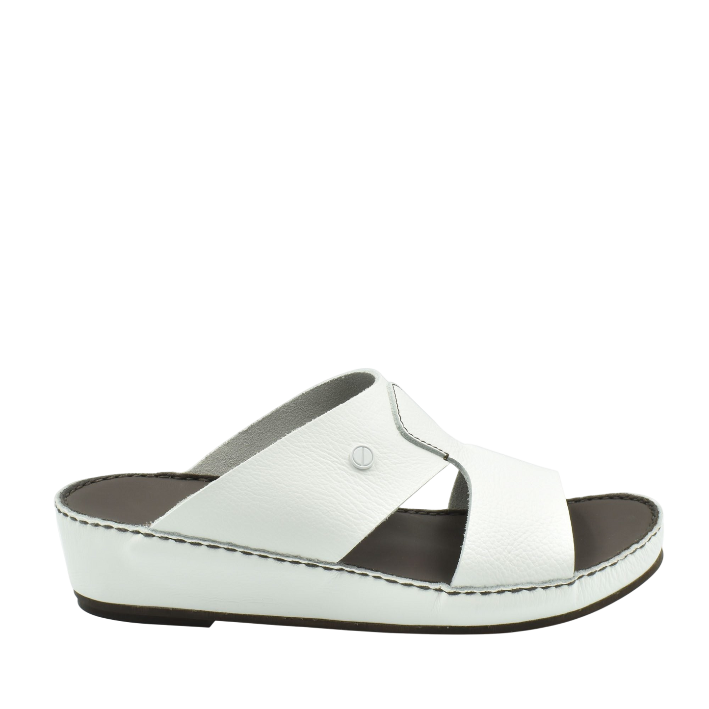 White luxury slip-on footwear with cushioned sole and cross strap design from private collection