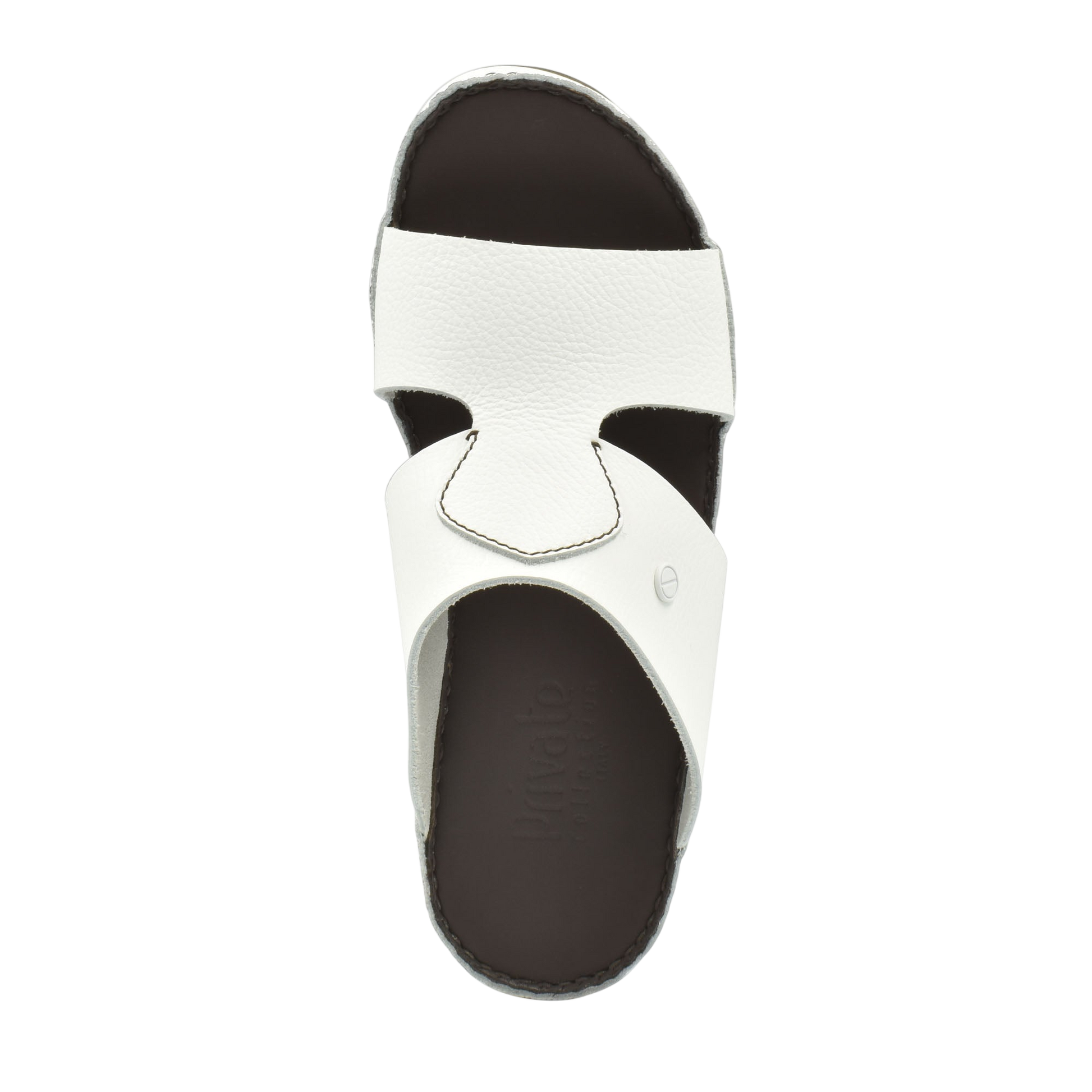 White luxury slip-on footwear with textured upper and dark cushioned footbed from Private Collection