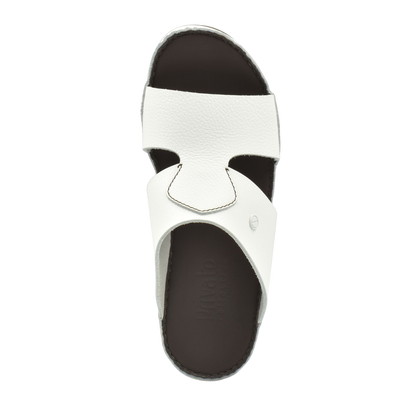 White luxury slip-on footwear with textured upper and dark cushioned footbed from Private Collection