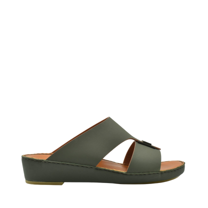 Side view of green Manetta Rubbercalf sandals with open toe and cushioned sole