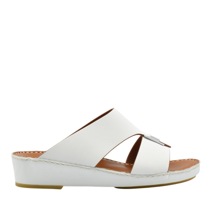 White Manetta Rubbercalf sandals with crisscross straps and a low wedge sole from Private collection