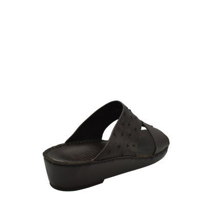 Black ostrich embossed slip on sandals with low wedge heel for comfortable wear