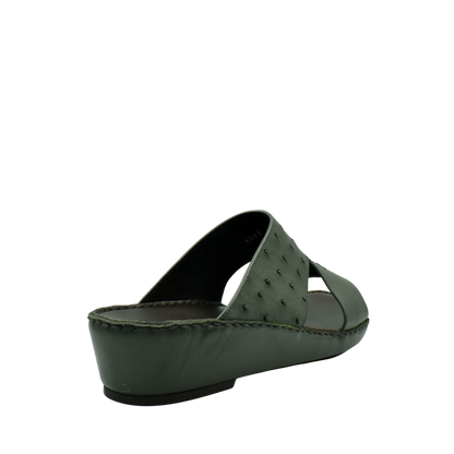 Dark green ostrich embossed slip on sandals with open toe and cushioned sole