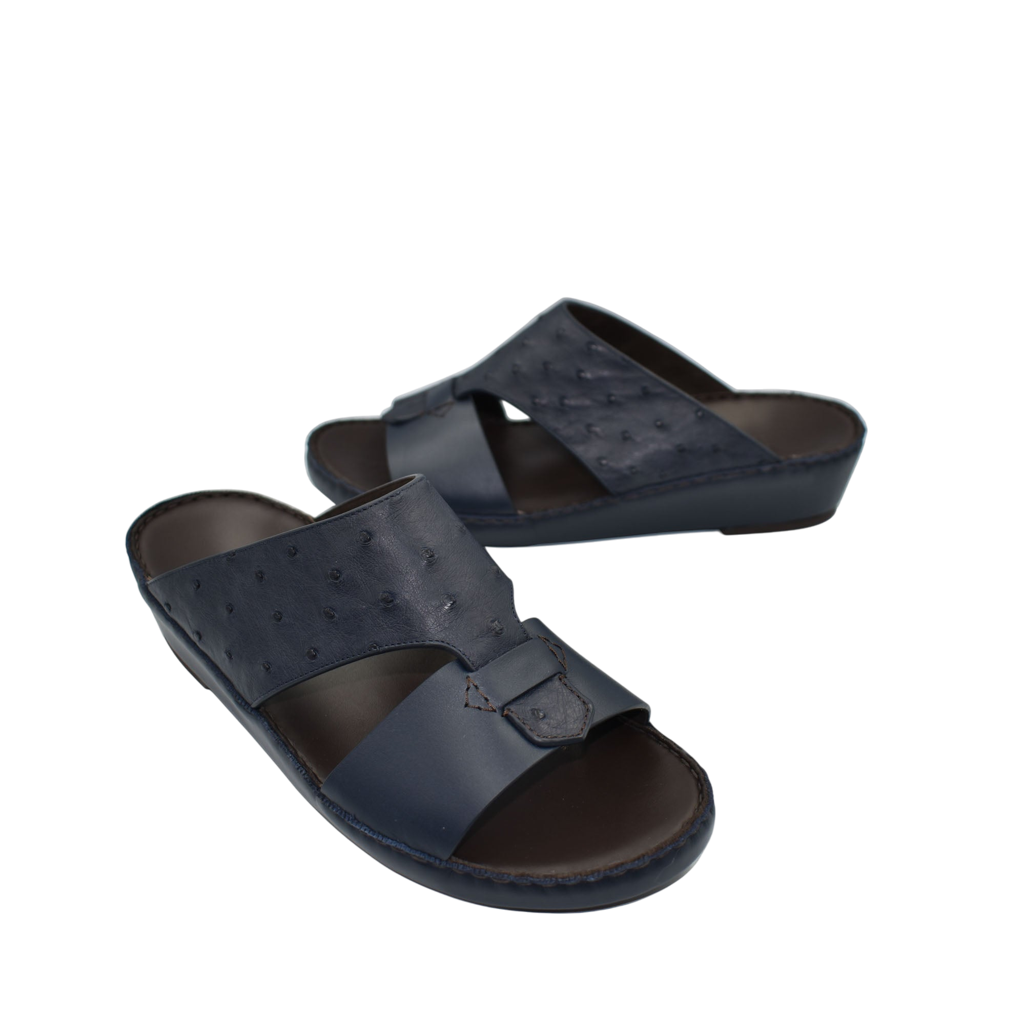 Black ostrich embossed slip on sandals with cushioned sole and open toe design