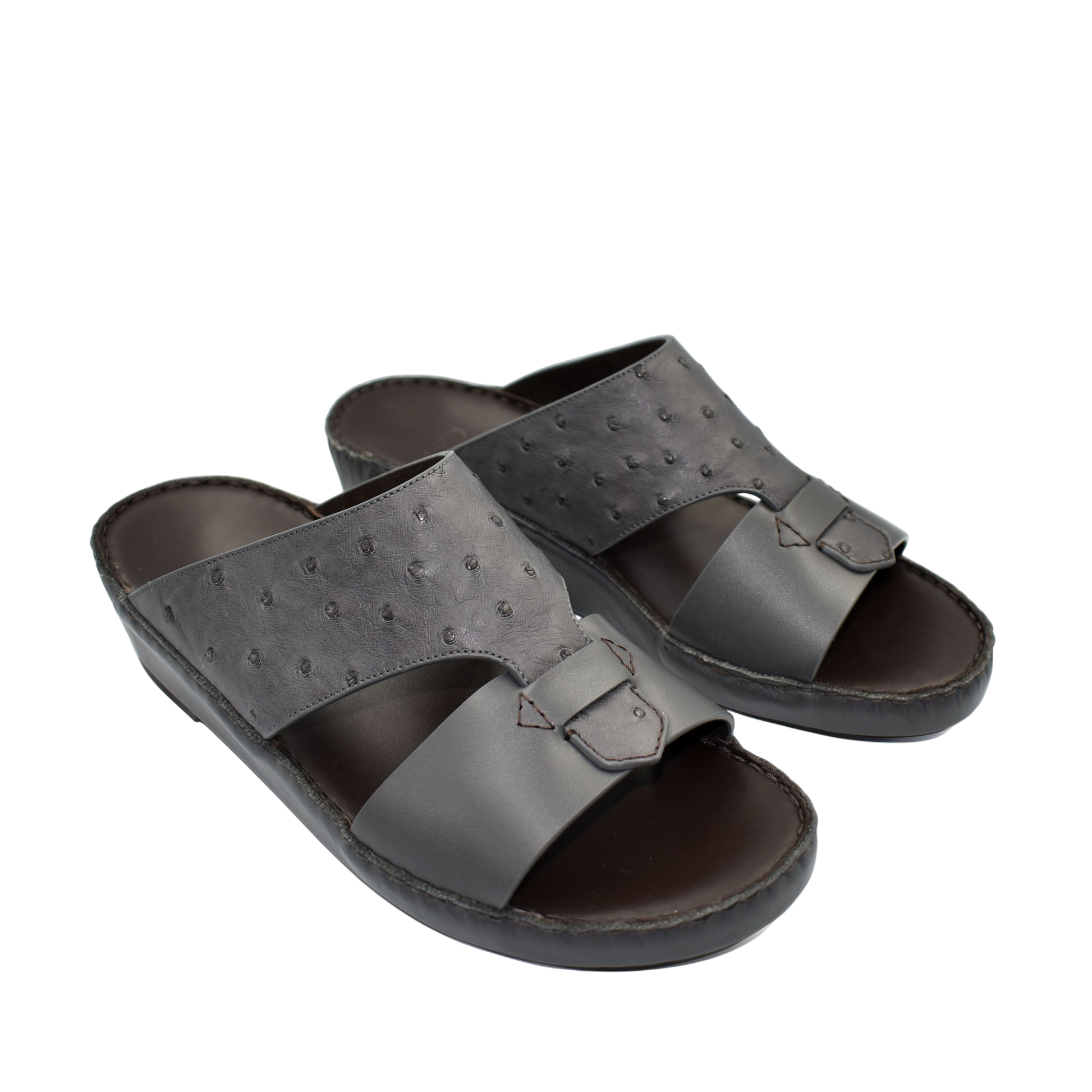 Black ostrich embossed slip on sandals with adjustable strap and cushioned sole