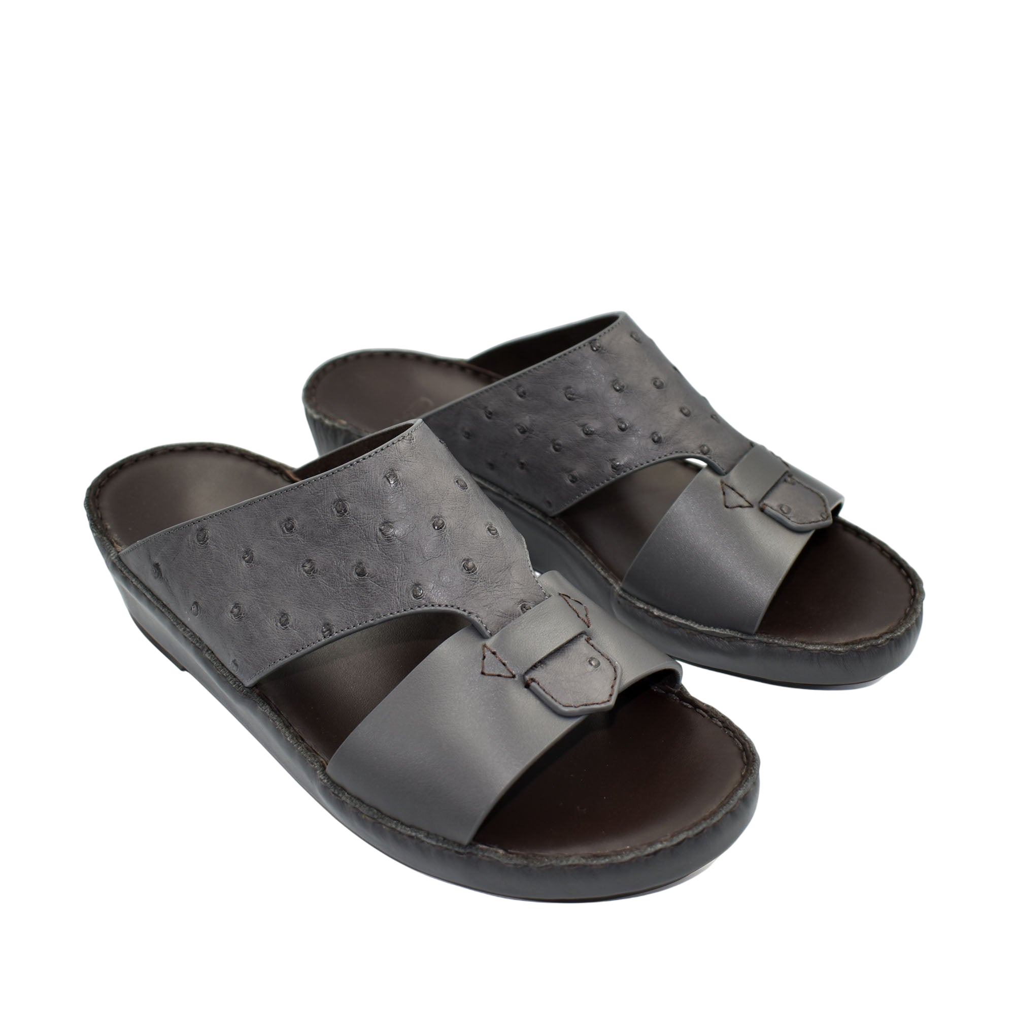 Black ostrich embossed slip on sandals with adjustable strap and cushioned sole