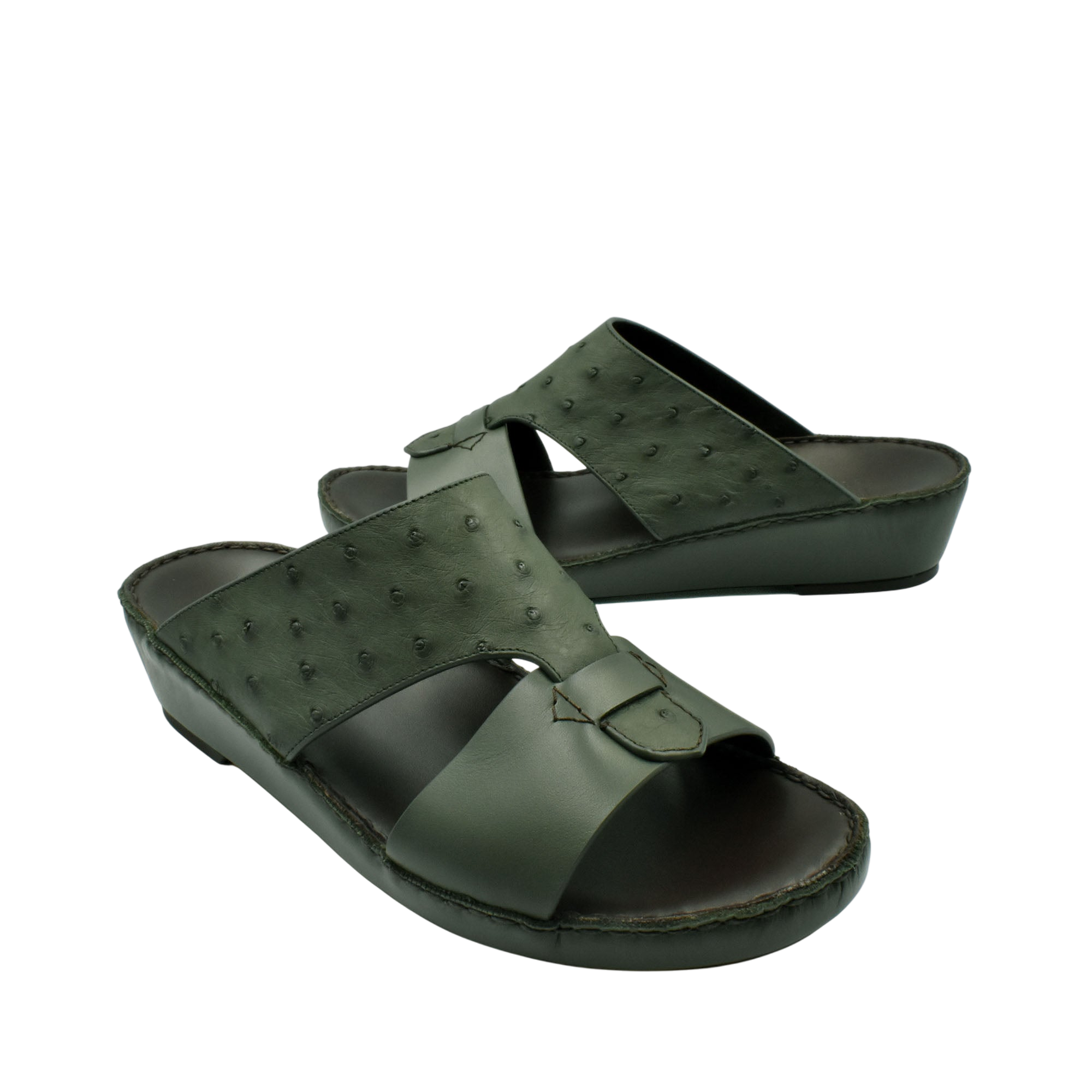 Dark green ostrich embossed slip on sandals with cushioned sole for comfortable wear