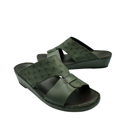 Dark green ostrich embossed slip on sandals with cushioned sole for comfortable wear