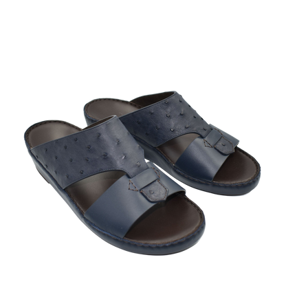 Navy blue ostrich embossed slip on sandals with open toe and adjustable strap