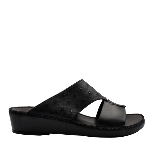 Black ostrich embossed slip on sandals with open toe and comfortable wedge sole for casual wear