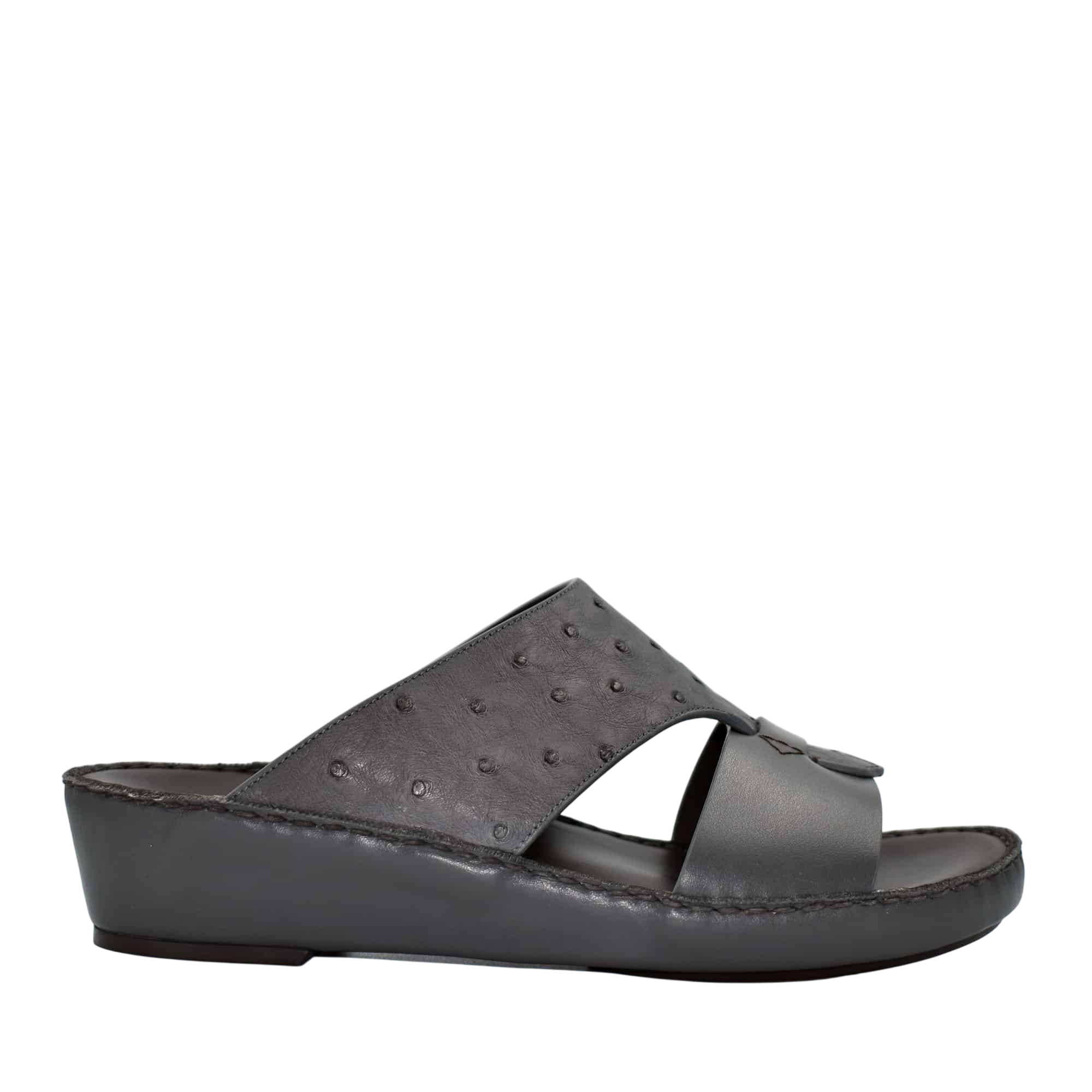 Black ostrich embossed slip on sandals with cushioned wedge sole from Private collection