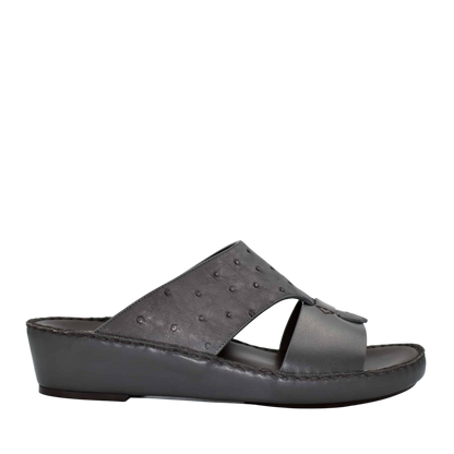 Black ostrich embossed slip on sandals with cushioned wedge sole from Private collection
