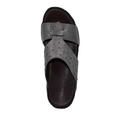 Black ostrich embossed slip on sandals with textured upper and cushioned sole for comfort
