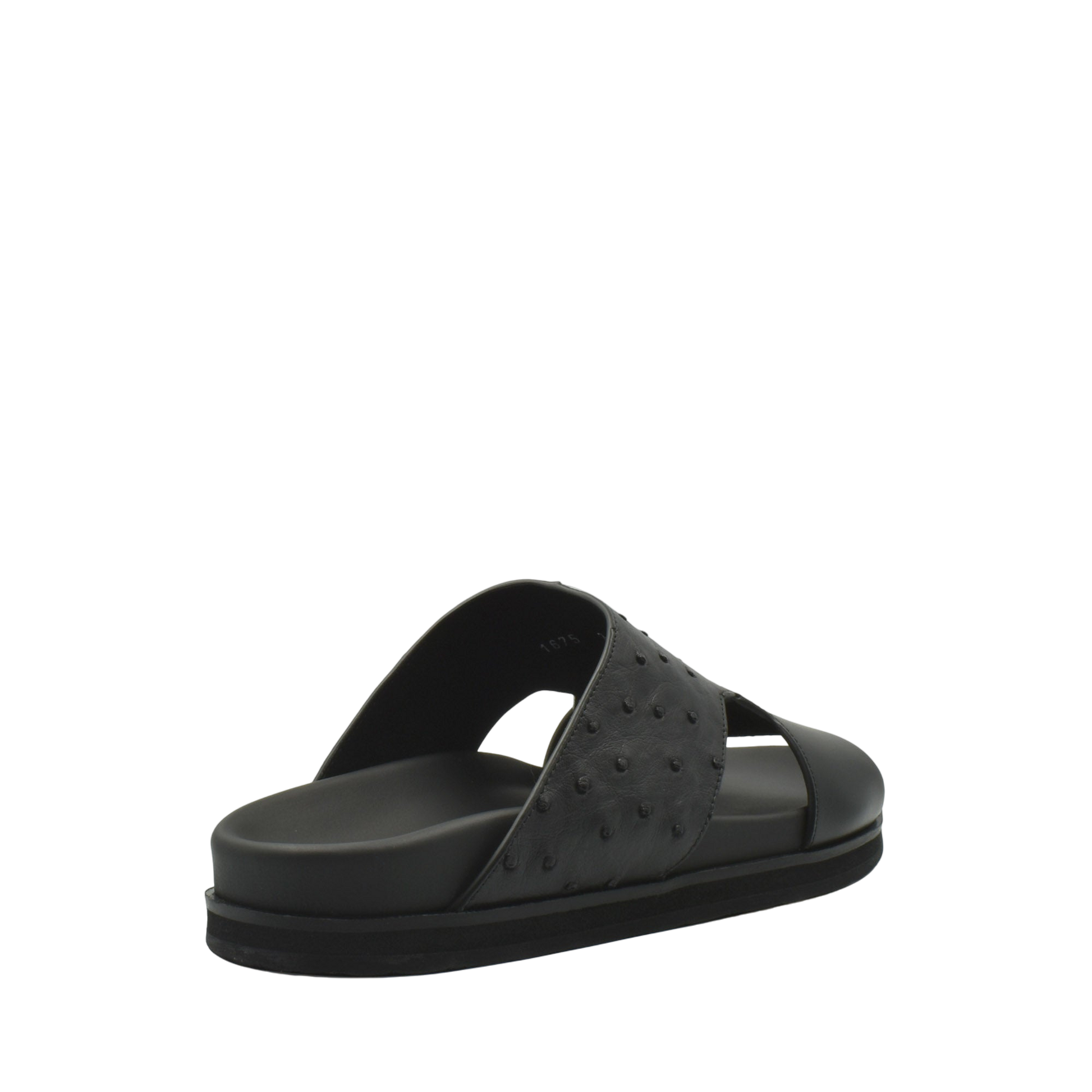 Black slide sandal featuring ostrich leather footwear with textured upper and cushioned sole