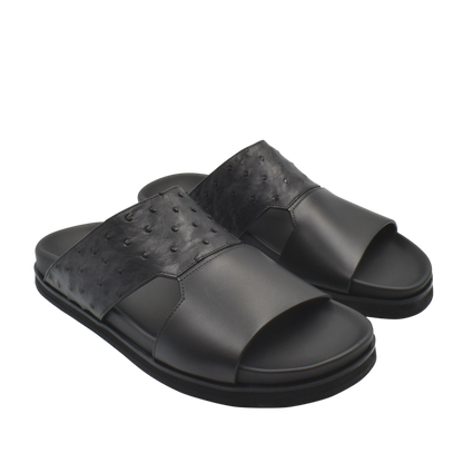 Black open-toe slides made with premium ostrich leather footwear featuring textured leather straps