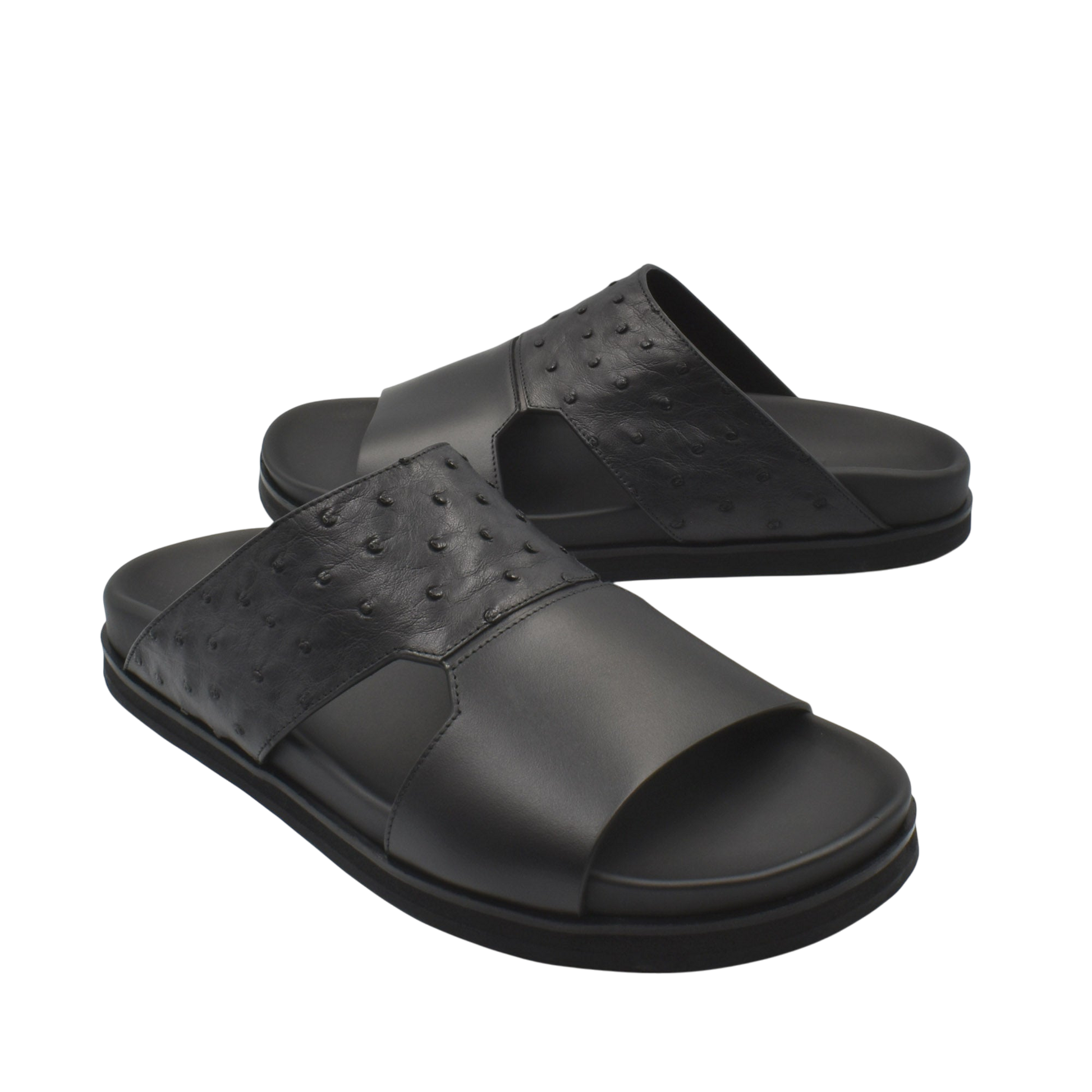 Black ostrich leather footwear slide sandals with textured upper and cushioned sole