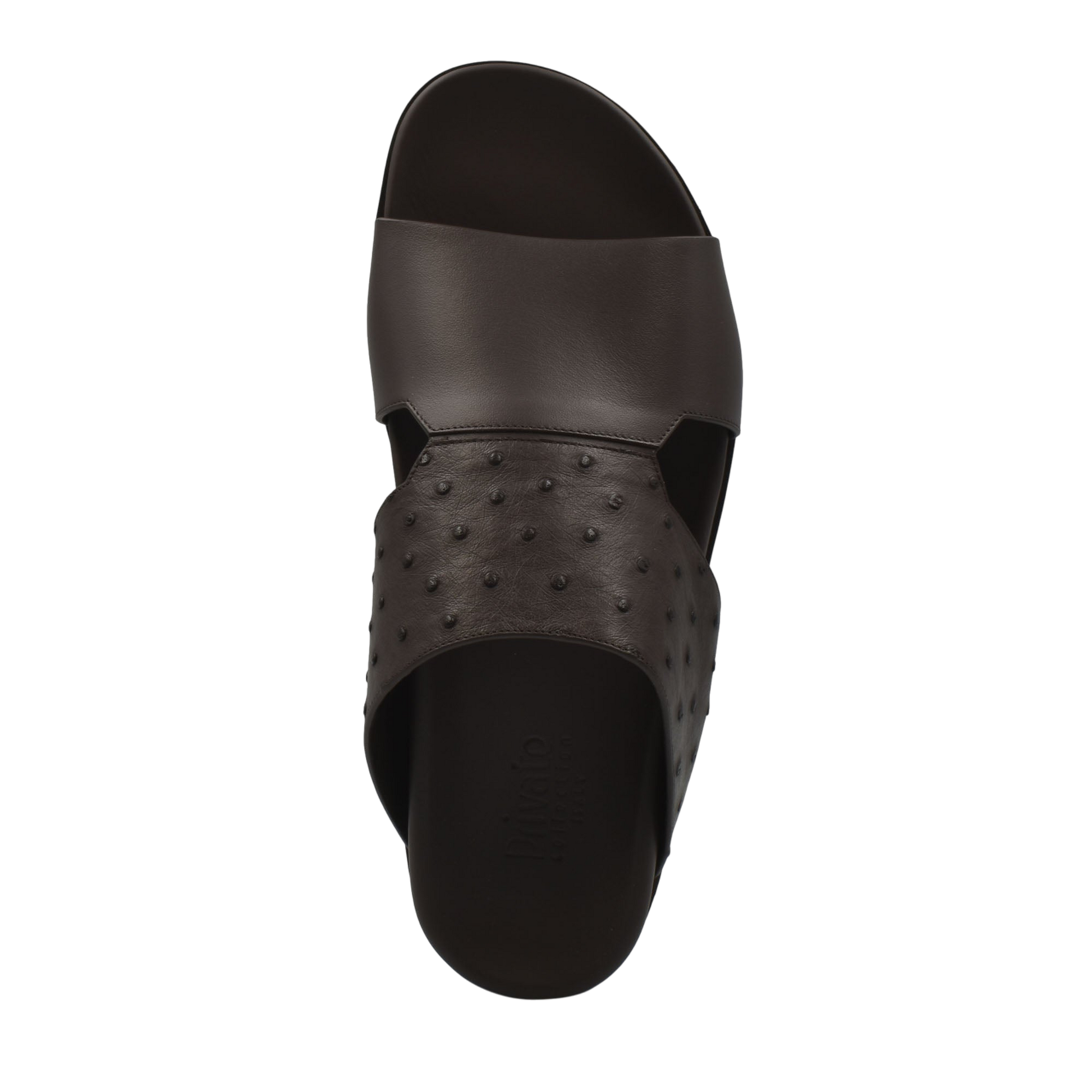 Black slide sandal with smooth and textured design made from ostrich leather footwear