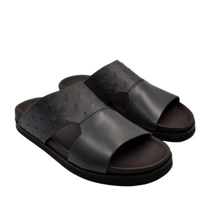 Black open-toe slide sandals made from premium ostrich leather footwear with cushioned sole