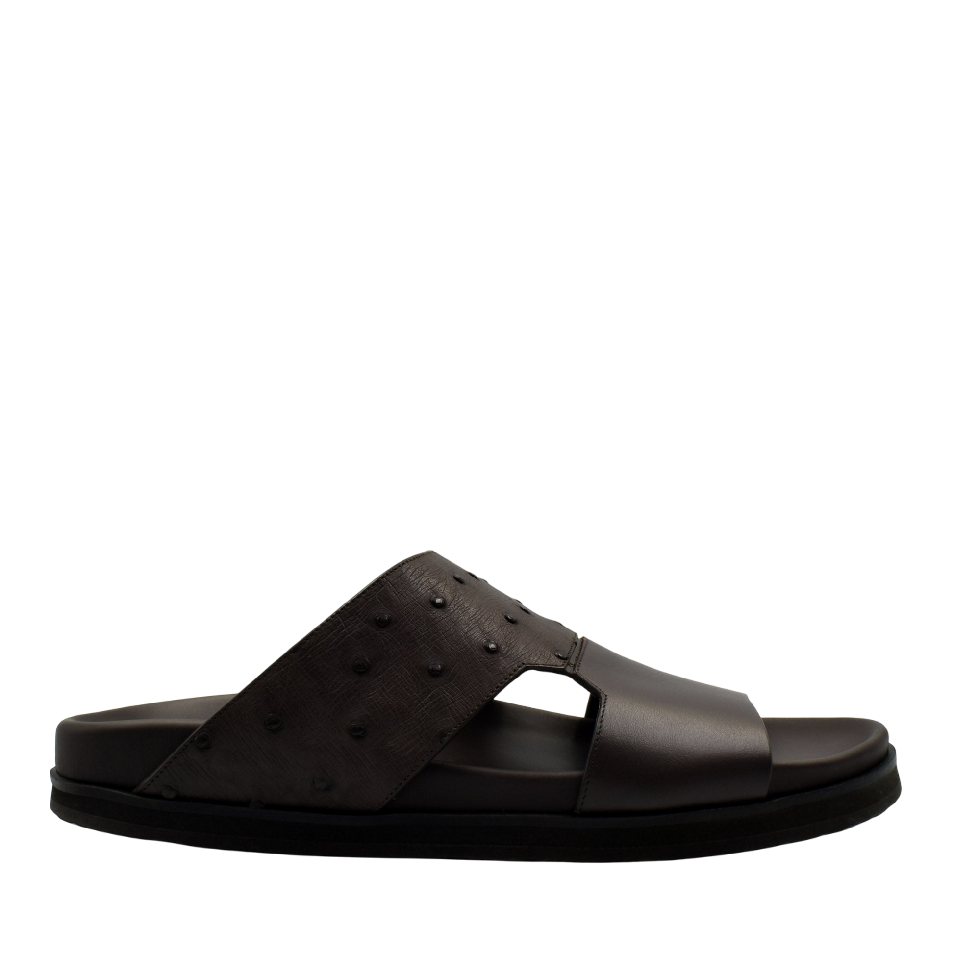 Black slide sandal featuring ostrich leather footwear with textured upper strap from private collection