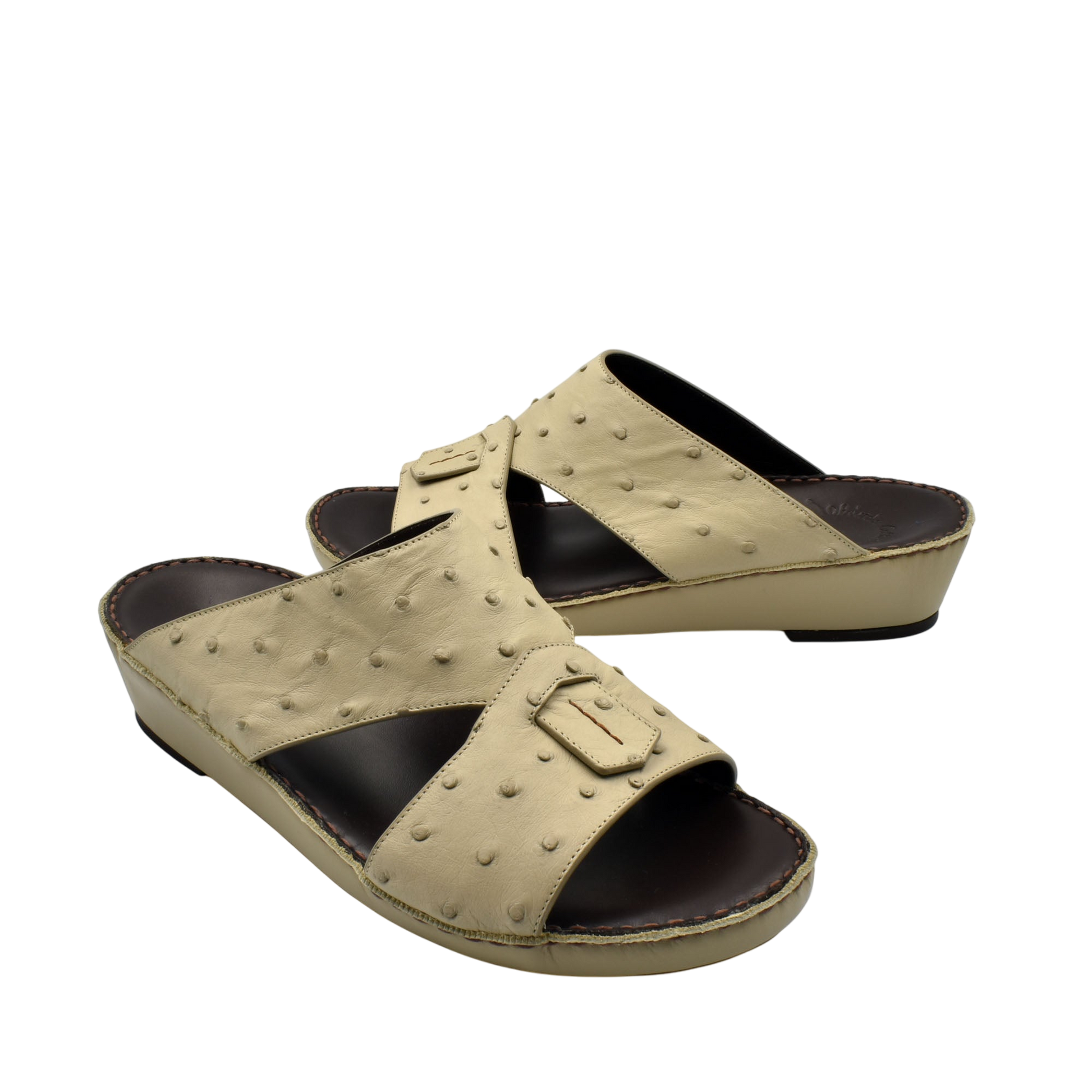 Beige ostrich leather sandals with open toe and adjustable buckle from Private collection