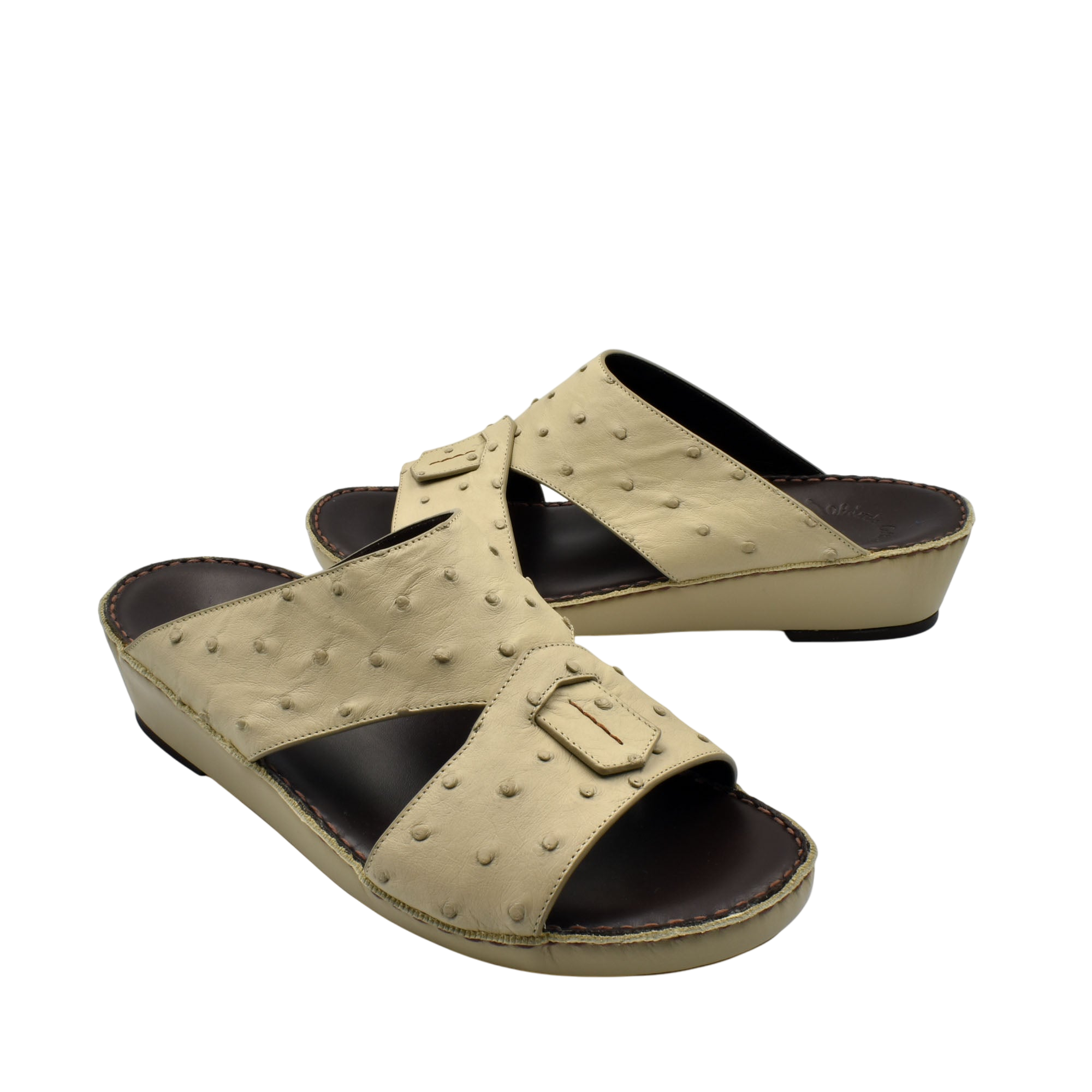 Beige ostrich leather sandals with open toe and adjustable buckle from Private collection