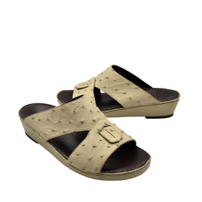 Beige ostrich leather sandals with open toe and adjustable buckle from Private collection