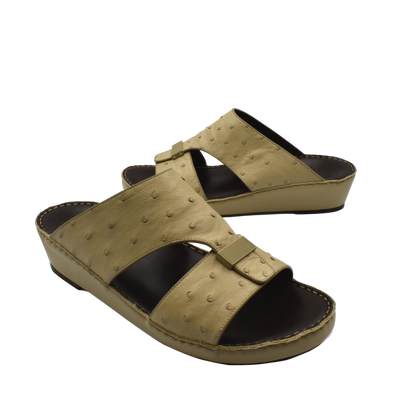 Tan ostrich leather sandals with open toe and wedge sole for comfortable casual wear