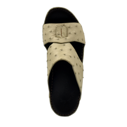 Beige ostrich leather sandals with textured straps and black sole from private collection