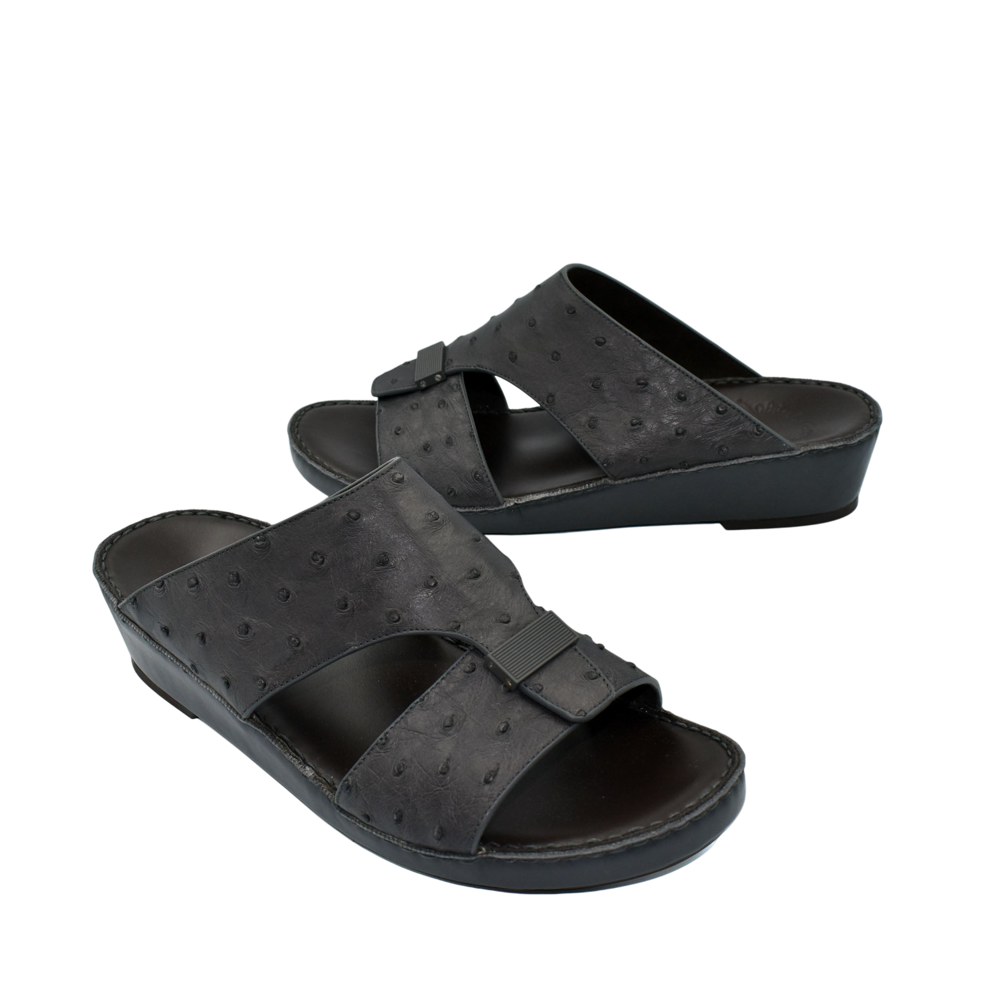 Black ostrich leather sandals with open toe and adjustable strap from Private Collection