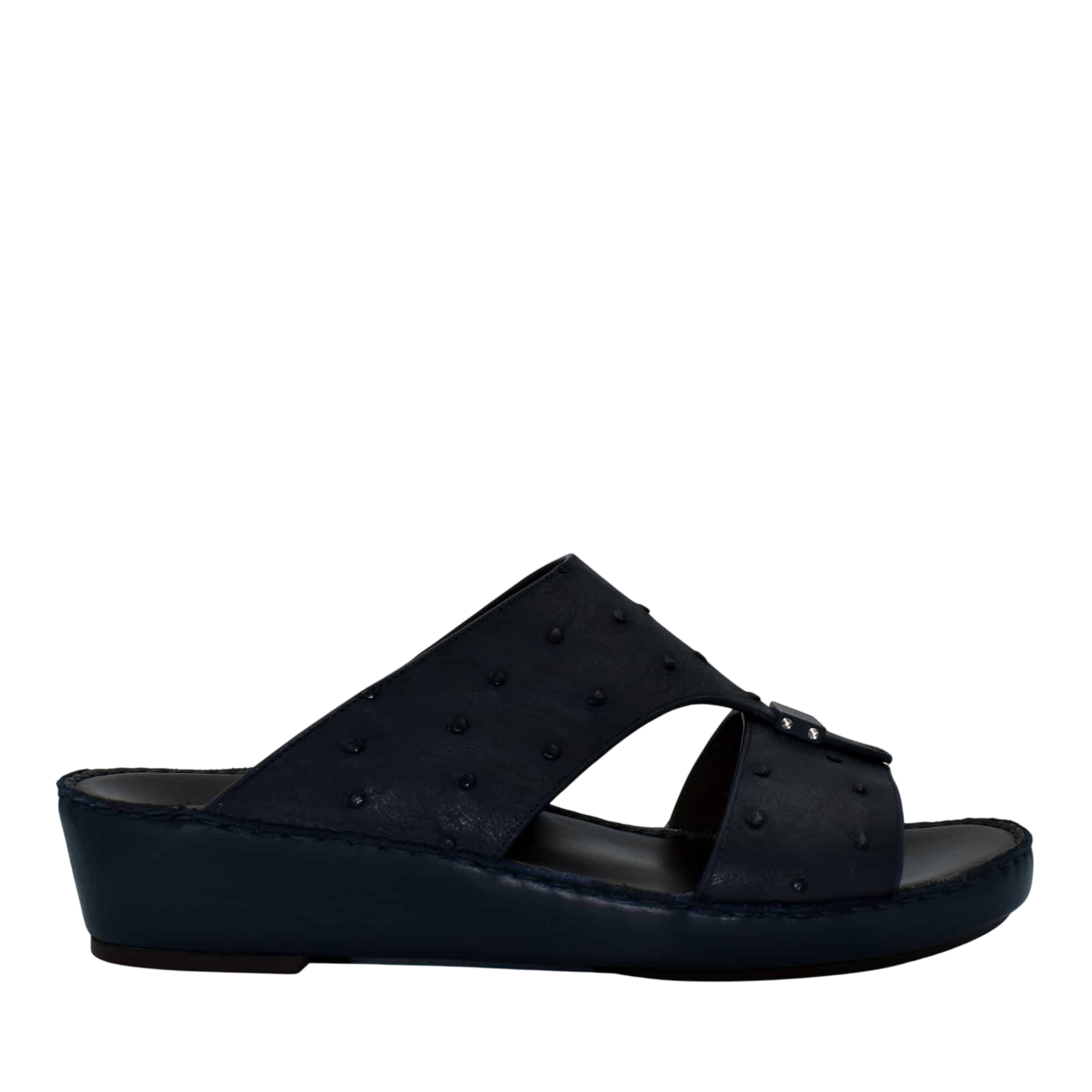 Black ostrich leather sandals with a wedge sole and textured upper from Private Collection