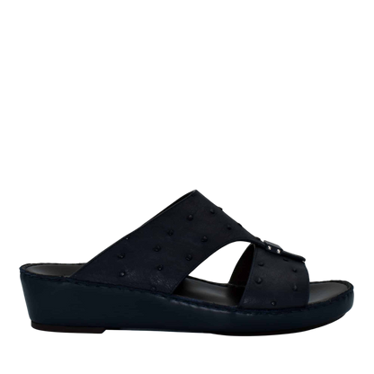 Black ostrich leather sandals with a wedge sole and textured upper from Private Collection