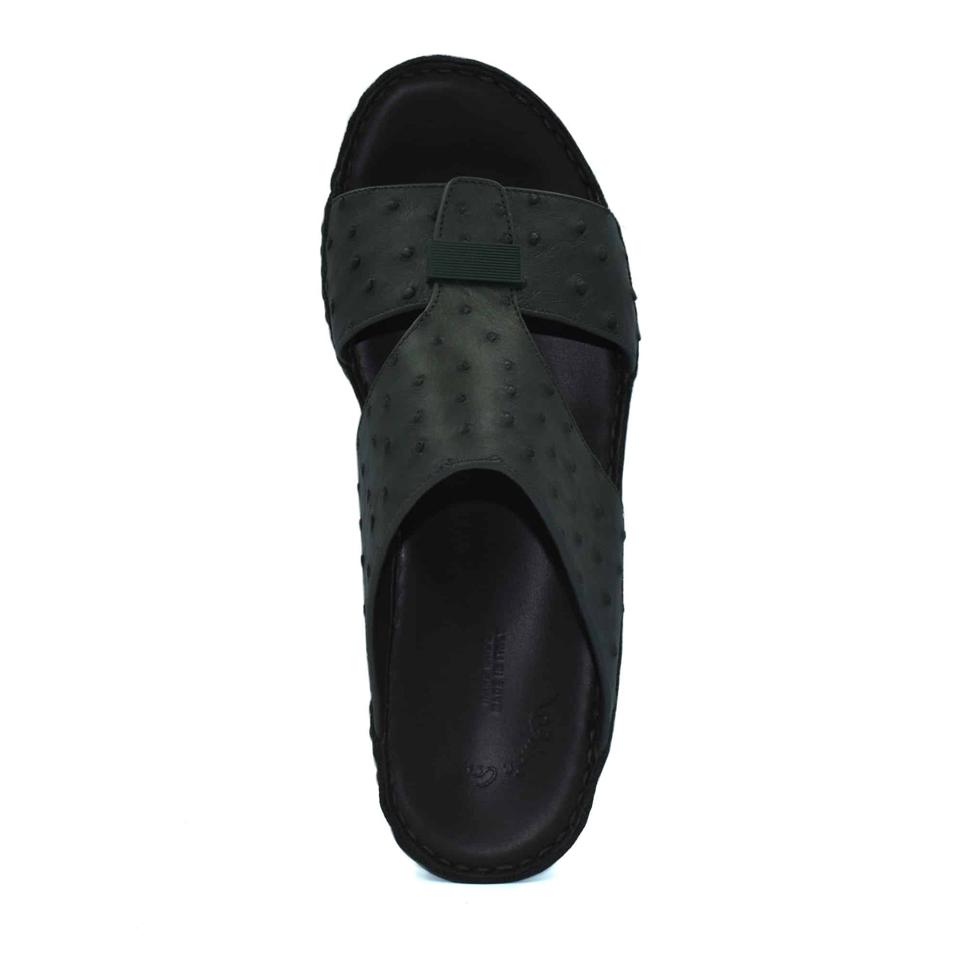 Top view of black ostrich leather sandals with crossed straps and cushioned footbed
