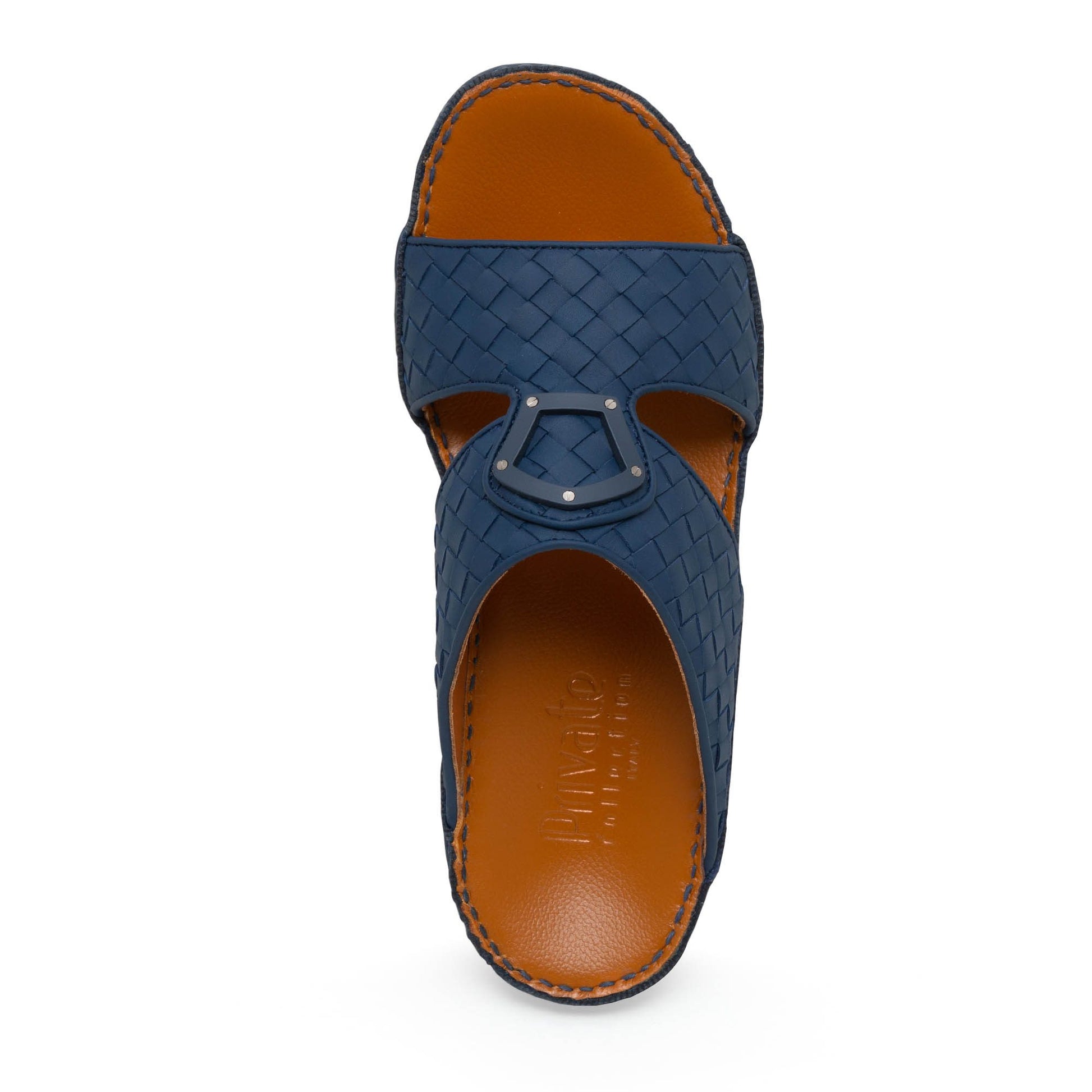Top view of blue Peninsula Classica Trecce sandals with woven leather design and brown insole