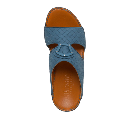 Top view of blue Peninsula Classica Trecce sandals with braided leather straps and brown sole