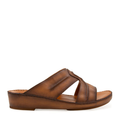 Brown leather slip-on sandal from Peninsula Laceto footwear with cushioned sole and open toe design