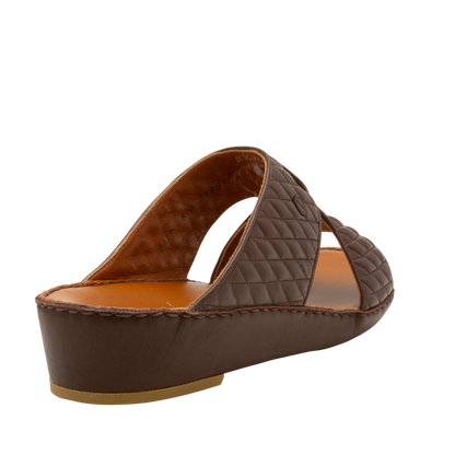 Brown Peninsula Lamb Matelasse sandals with quilted leather upper and wedge sole from Private collection