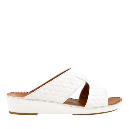 White Peninsula Lamb Matelasse sandals with quilted leather straps and low wedge sole