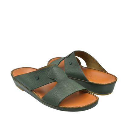 Pair of Peninsula Nouvo Deercalf sandals in dark green leather with tan cushioned footbed for comfortable wear