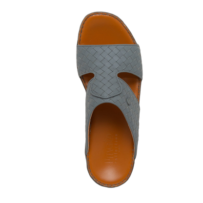 Gray woven leather Peninsula Trecce sandals with orange cushioned footbed and slip-on design