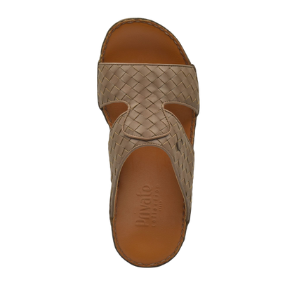 Top view of beige Peninsula Trecce sandals with woven strap design and brown footbed