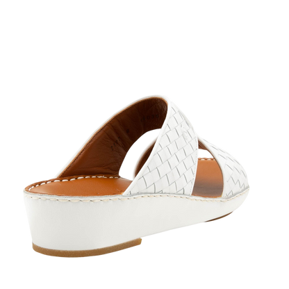 White woven leather Peninsula Trecce sandals with low wedge heel and tan cushioned insole