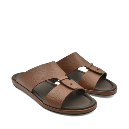 Brown premium leather sandal with dual straps and cushioned footbed for comfortable wear