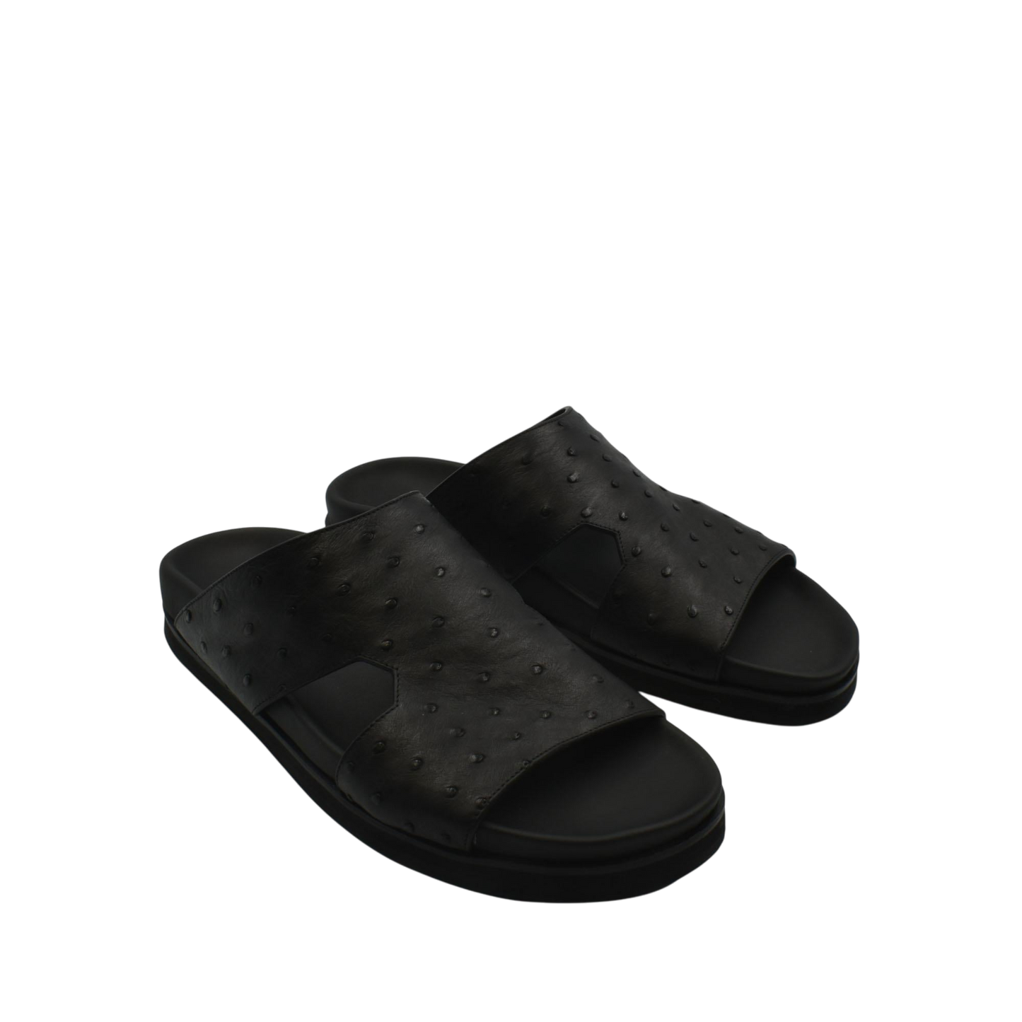 Black slip-on premium ostrich leather footwear sandals with textured upper and cushioned sole