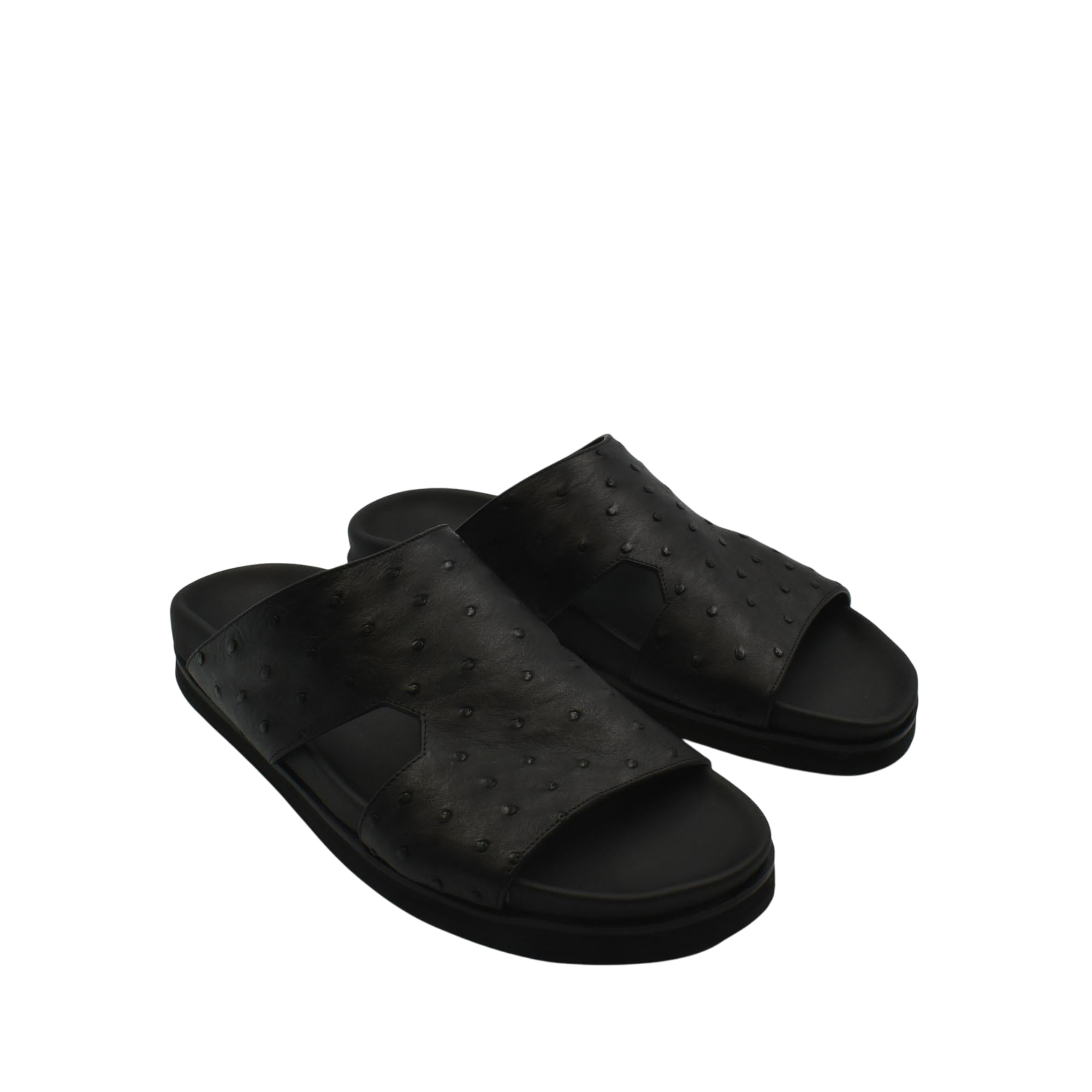 Black slip-on premium ostrich leather footwear sandals with textured upper and cushioned sole