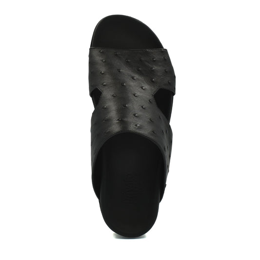 Black slide sandal made of premium ostrich leather footwear with textured pattern from private collection