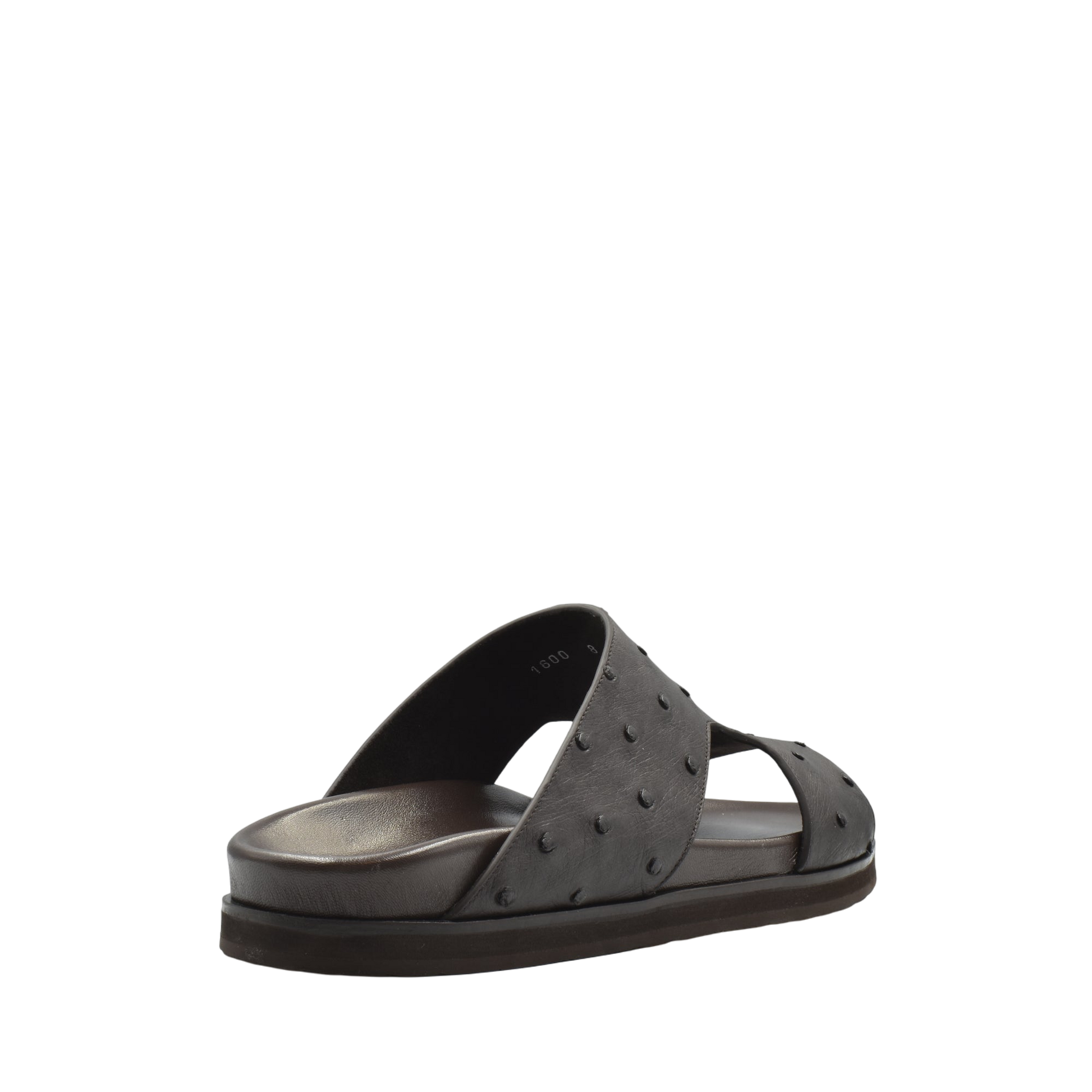 Black slip-on sandal made from premium ostrich leather footwear with textured design