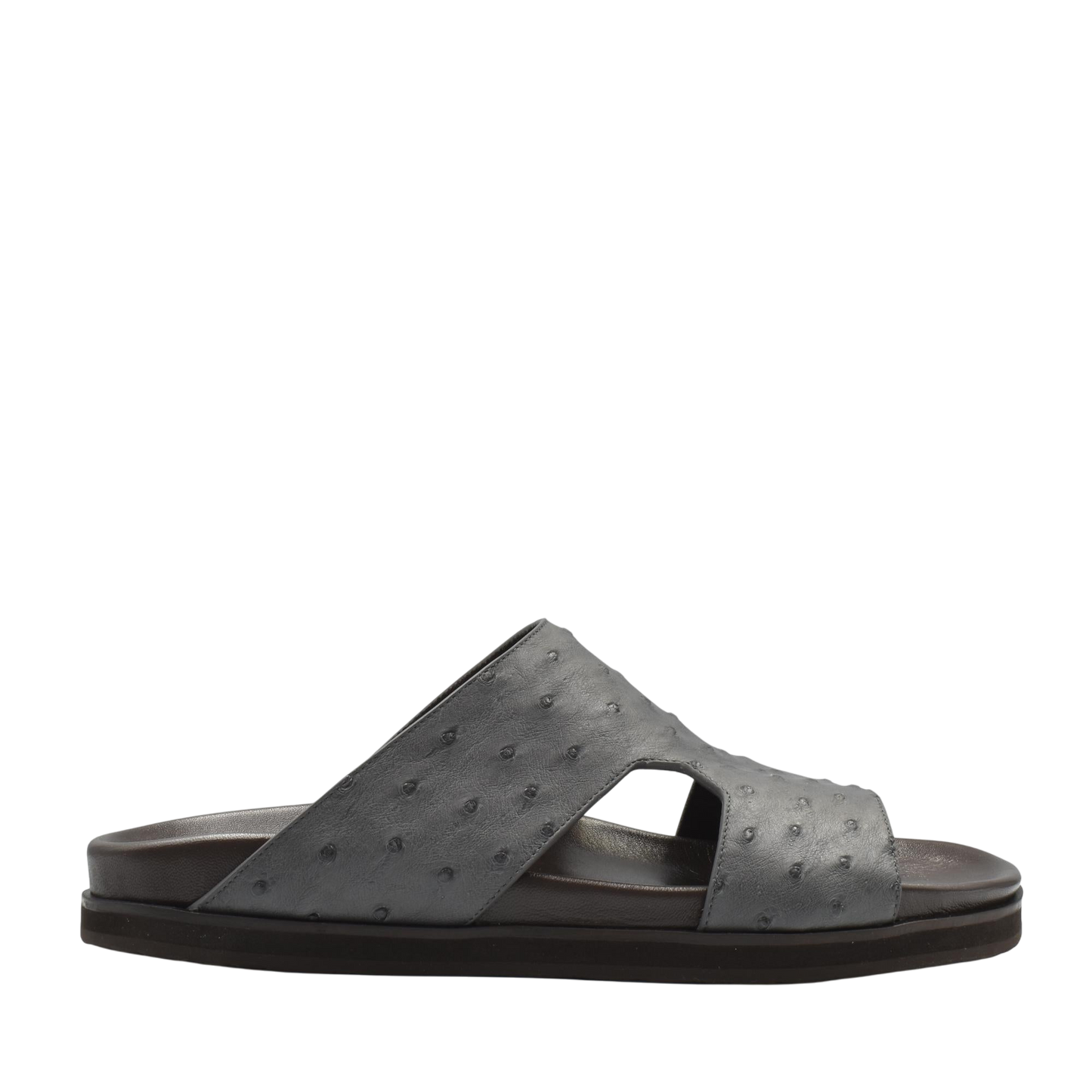 Black slide sandal made of premium ostrich leather footwear with textured leather and open design