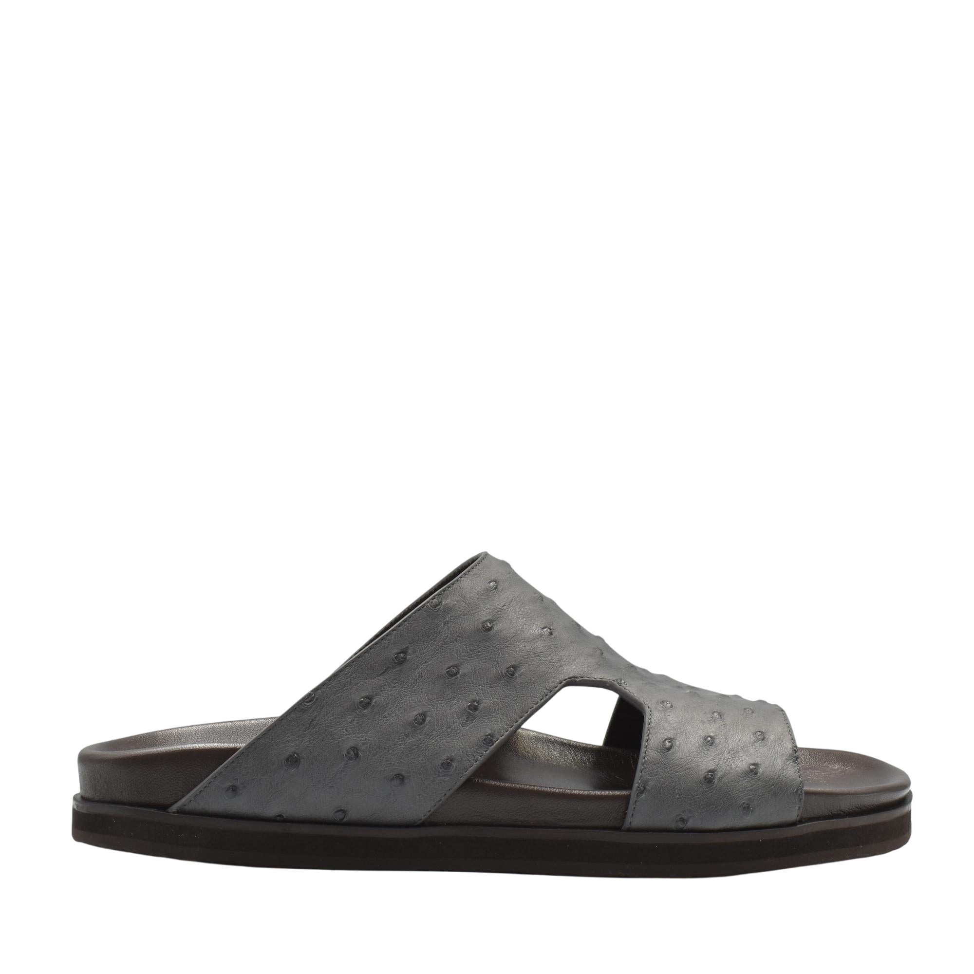 Black slide sandal made of premium ostrich leather footwear with textured leather and open design