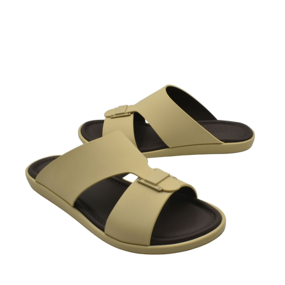 Beige and brown slip-on sandals from Private Collection featuring prestige casual footwear design with buckle straps